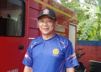 Damkar Pos Sebatik Timur Lakukan Evakuasi Biawak