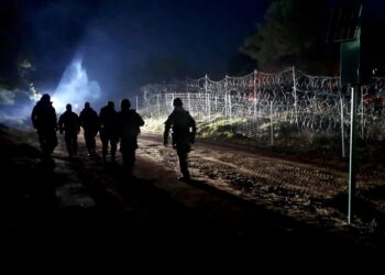 Krisis Migran Belarusia Berisiko Bentrokan Militer