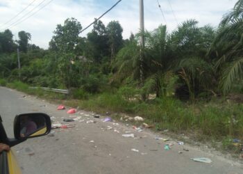 Sampah Berserakan di KM 6 Jalan Poros Tanah Kuning